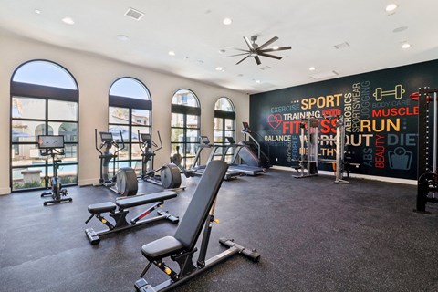 Gym with treadmills and weights at Arrive Temecula